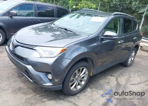 2018 Toyota Rav4 Limited z USA, uszkodzony, nr VIN JTMYFREV9JD127737